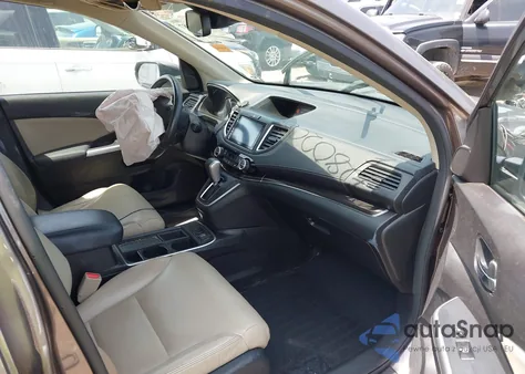 2015 Honda Cr-V Touring z USA, uszkodzony, nr VIN 5J6RM4H98FL126114